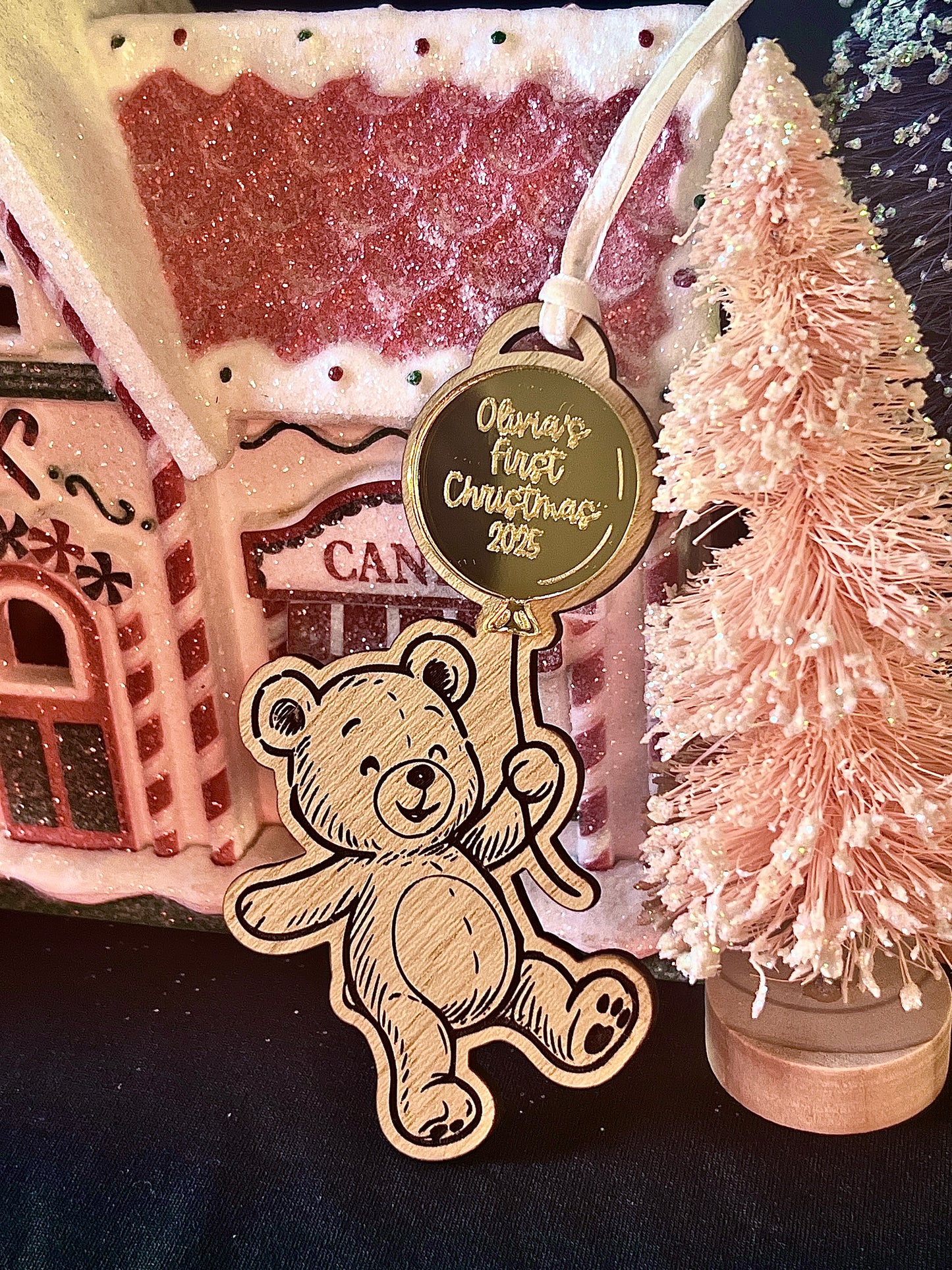 Wooden bear ornament with a 'First Christmas' 