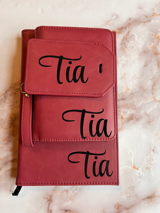 leather travel set with a notebook, wallet, and luggage tag 